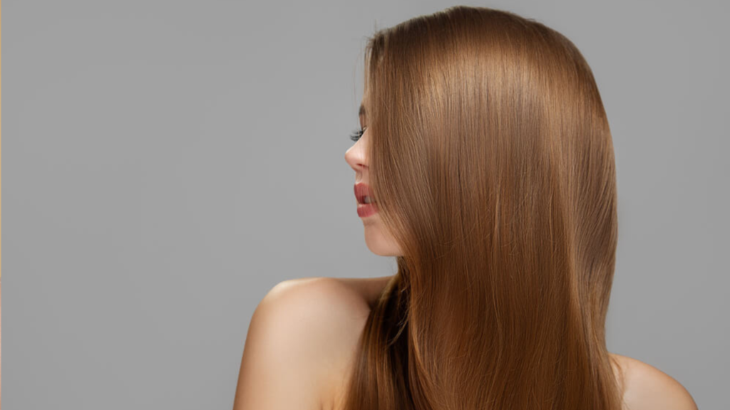 Glossy, healthy hair enhanced by a hair serum, showing vibrant shine and smooth texture|yourleaf.in